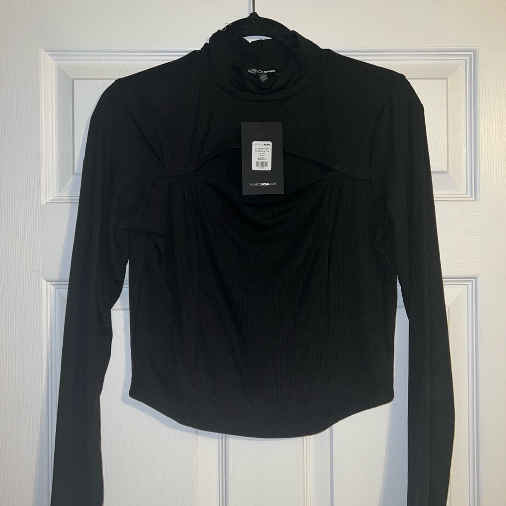 Top with the chest area open. From FASHION NOVA